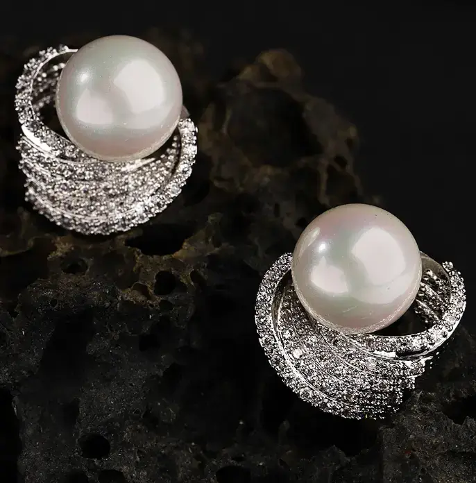 Carlton London Silver-Toned & Off-White Rhodium-Plated Spherical Stud Earrings on Myntra