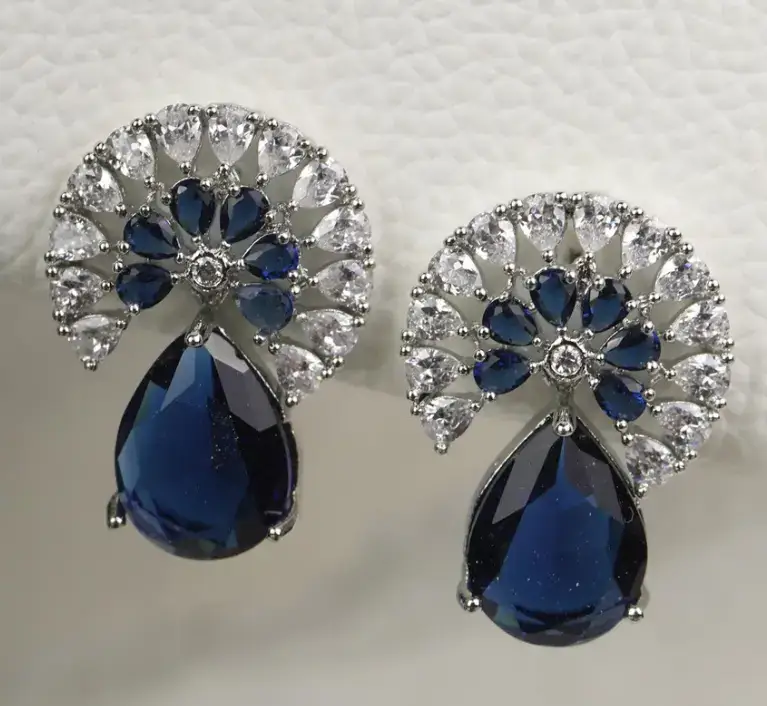 Priyaasi Blue Silver-Plated American Diamond Tear Drop Earrings on Myntra