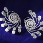 Rubans Silver-Plated Floral Stud Earrings on Myntra