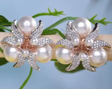 Saraf RS Jewellery White Floral Rose Gold-Plated Stud Earrings on Myntra